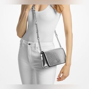 NWT $258 Michael Kors Jet Set Medium Metallic Crossbody Bag in silver.
